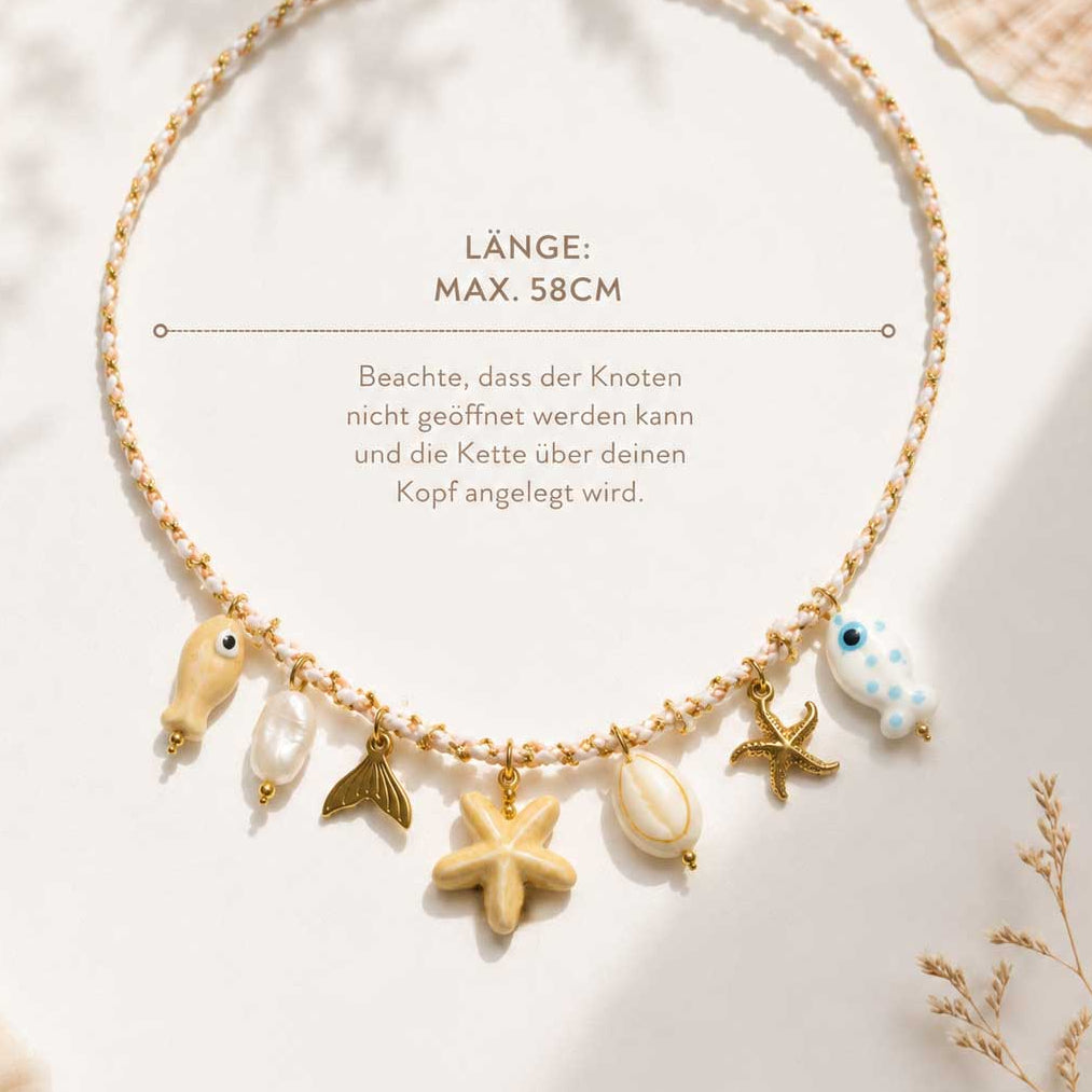 Salty Star Halskette Länge max. 58 cm – maritime Charm-Kette von Saltyblush, wird über den Kopf angelegt, 7 Charms aus Edelstahl, Infografik mit Größenangabe
